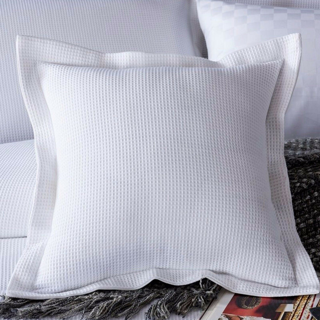 A pair of Bamboo Cotton White Waffle Standard Pillowcases or European Cushion covers